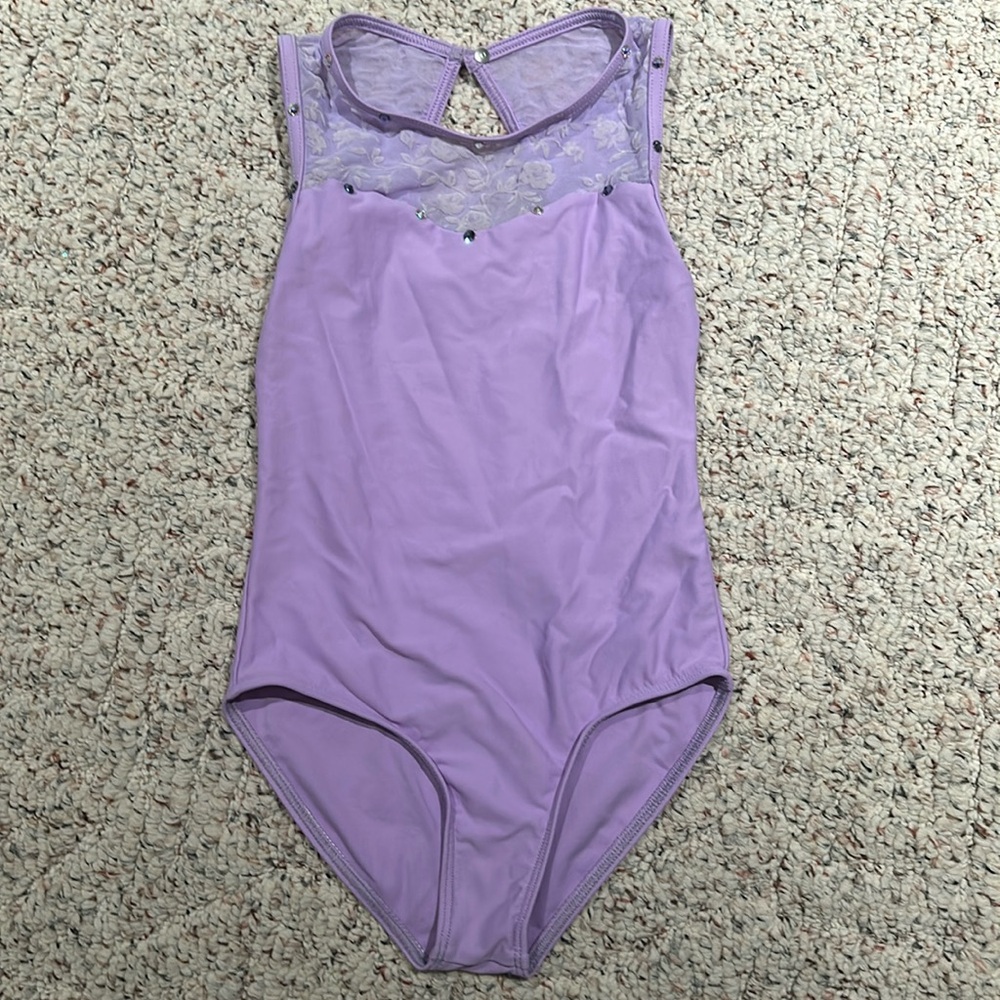 Light purple Wear Moi leotard with embellishments.